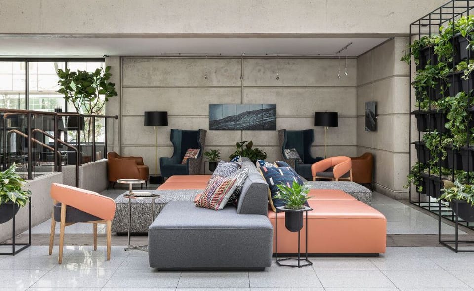 A spacious and well-lit lobby that offers the perfect mix of style and comfort.