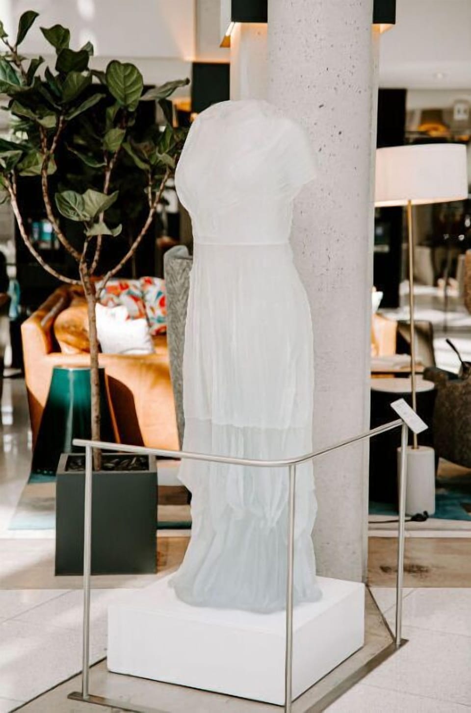 A sleek and modern art installation in the lobby that adds a touch of sophistication and intrigue for guests entering the hotel.