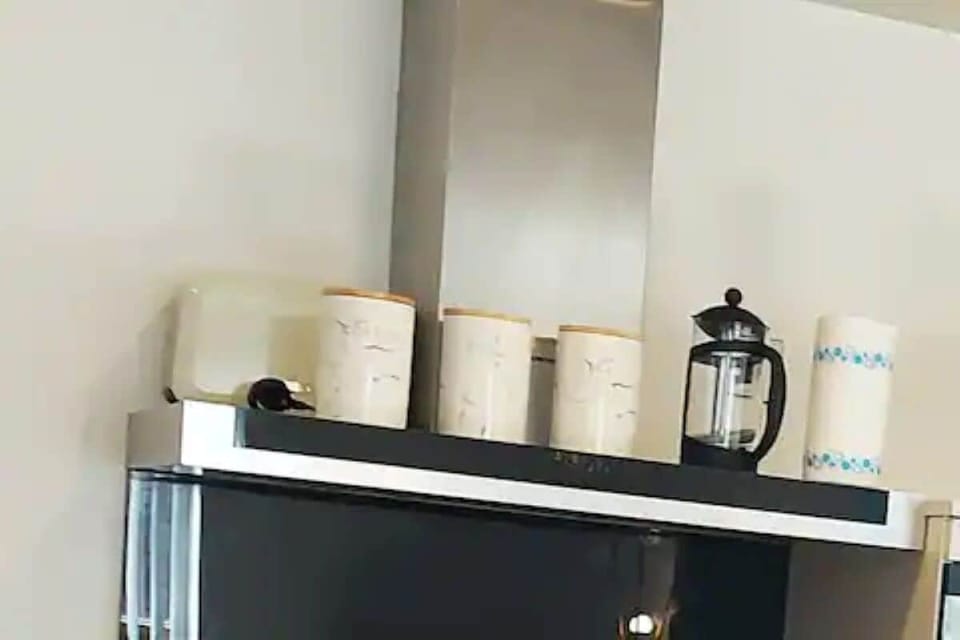 Kitchen with cooking hobs, free tea bags, coffee, electric kettle, cafeteria