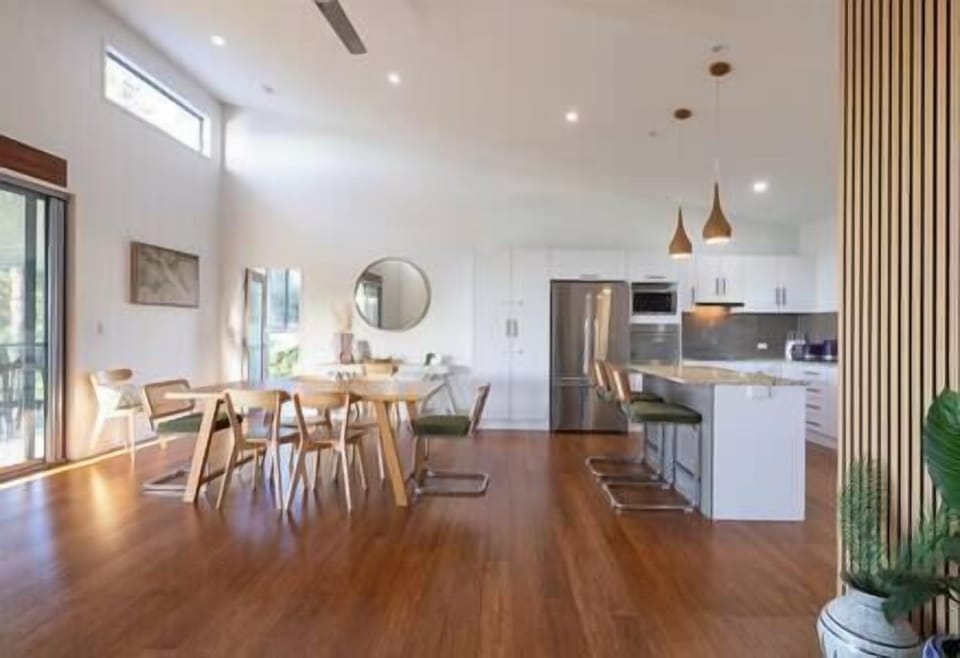 Inside dining - kitchen area with the days sunlight.