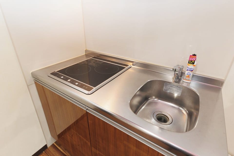 It's the kitchen. There are plates and cups inside the door.