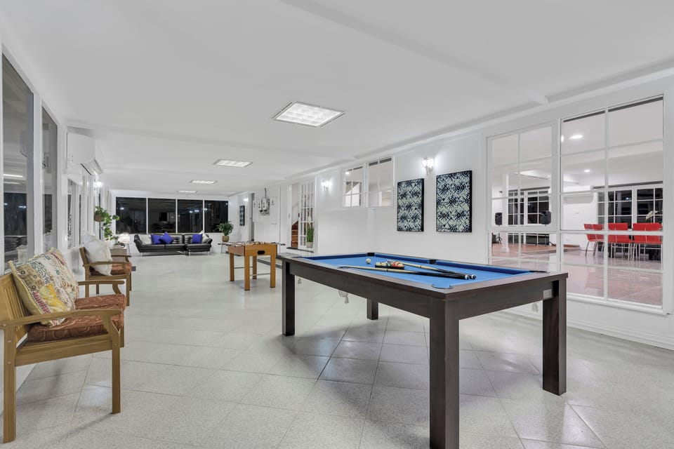 Games Room with Pool Table and Foosball