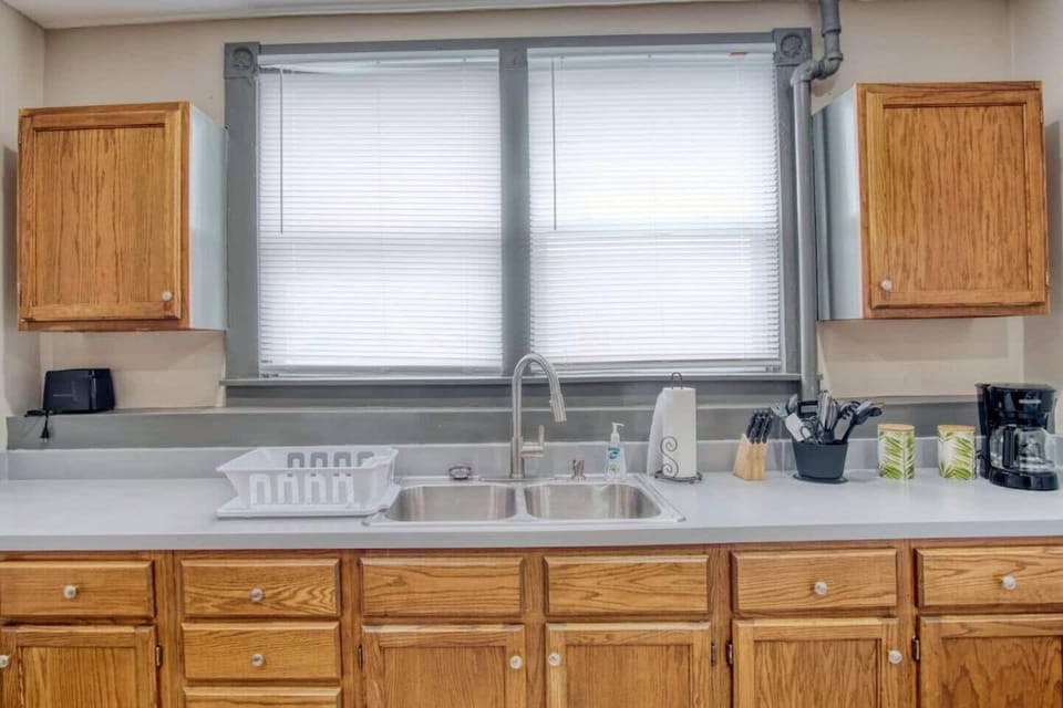 Experience the warmth of this classic kitchen, designed to inspire culinary creativity and gather loved ones.