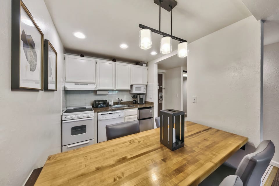 Your fully equipped kitchen features modern appliances and a spacious island where you can prepare meals and gather with loved ones.