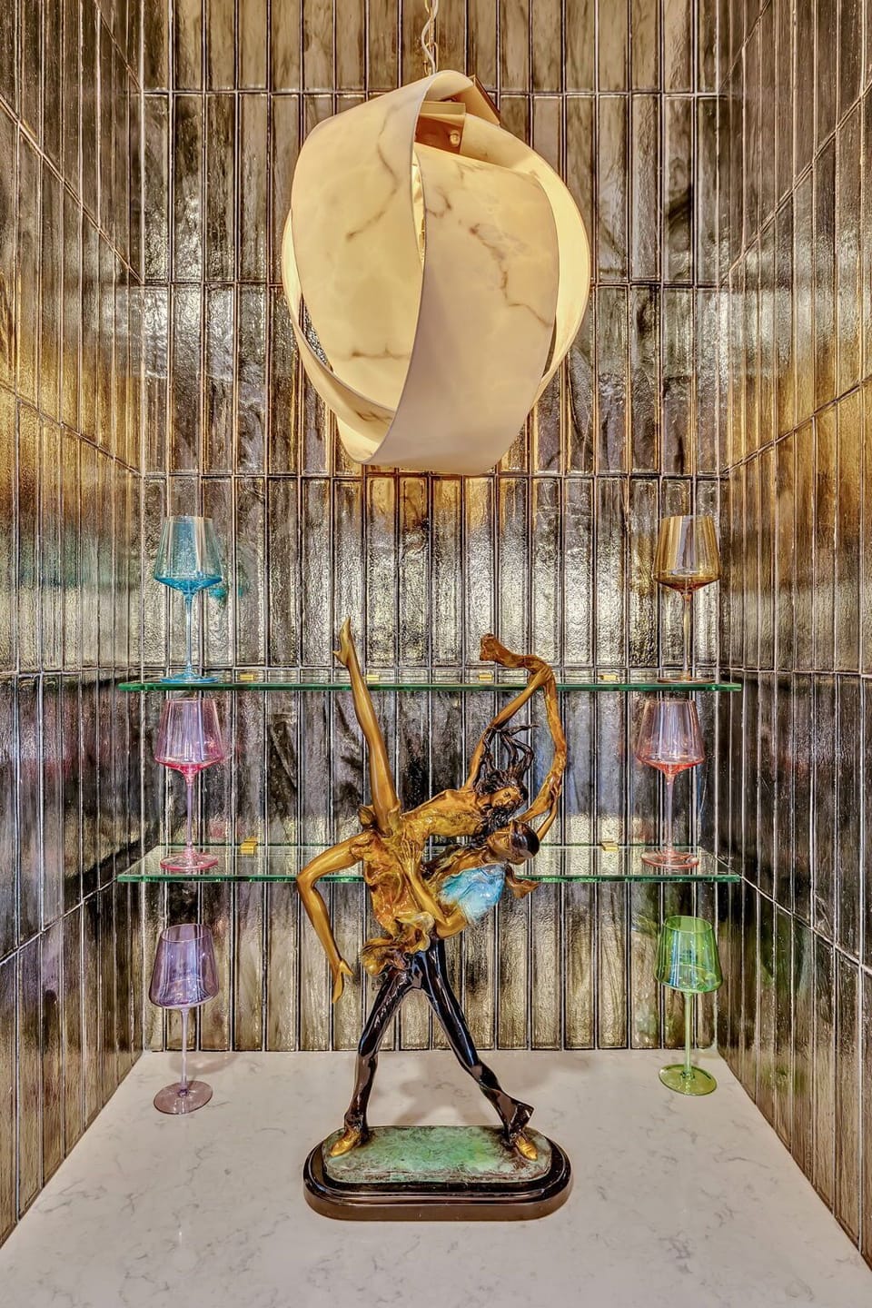 Decorated entrance with a wine cellar and leads to the kitchen and 4th bedroom