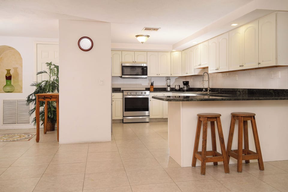 Make full use of our fully functional kitchen space, featuring modern appliances and a sleek finish.