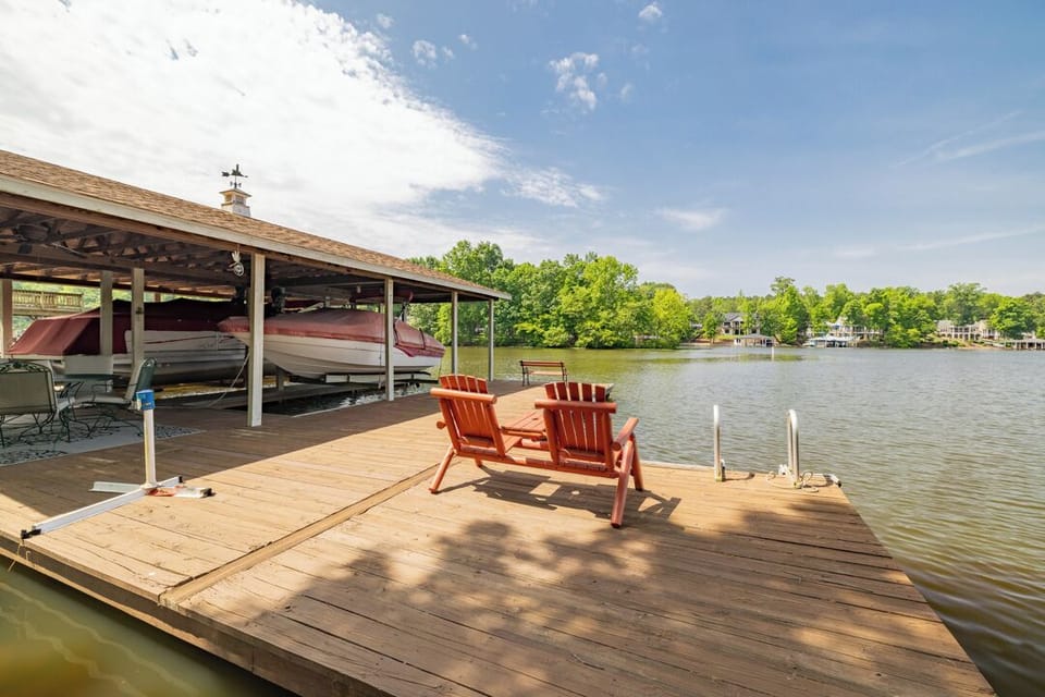 Dockside Retreat;  Relax in vibrant chairs just steps from stunning views.