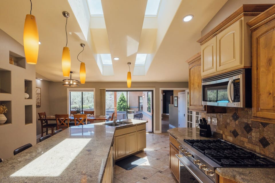 Full sized kitchen, complete with modern appliances and an island.