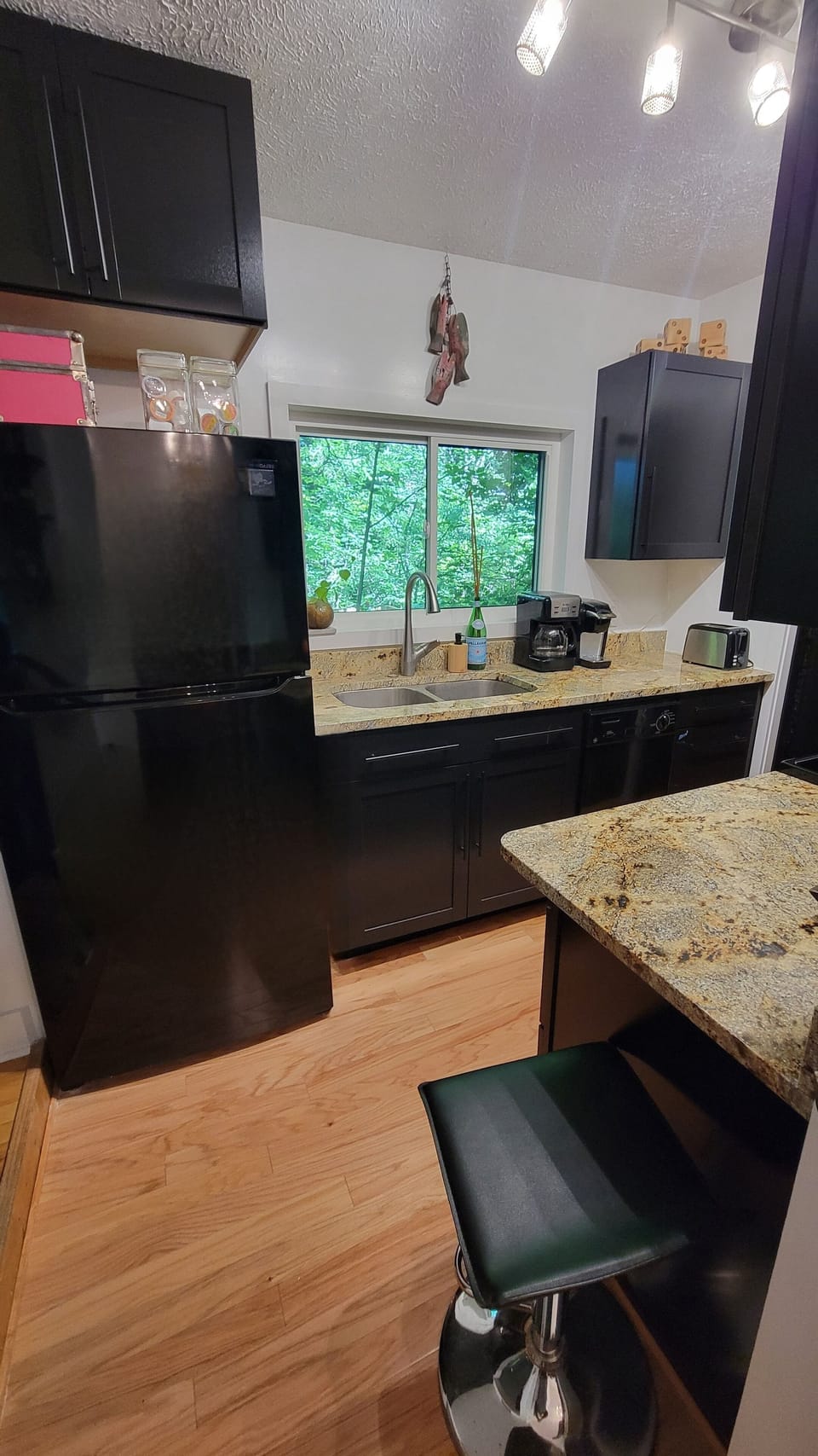 Watch the sun rise & the deer frolic through the trees as you make your coffee.