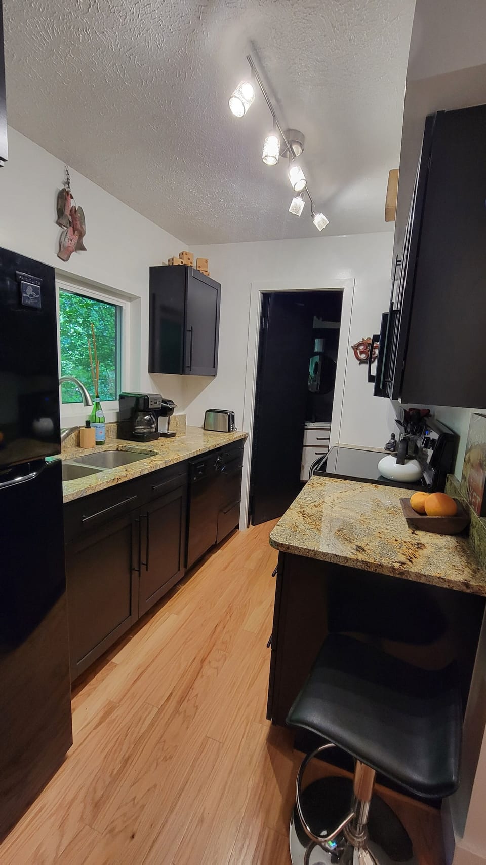 All-new kitchen with Calphalon nonstick cookware, large microwave, & full oven.