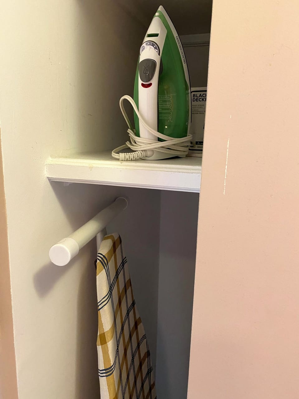 Bathroom Closet with iron/ironing board (towels not pictured)
