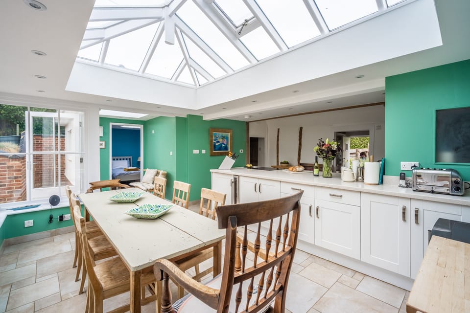 Myrtle Cottage, Friston: Dining area with doors leading to the rear, terraced garden