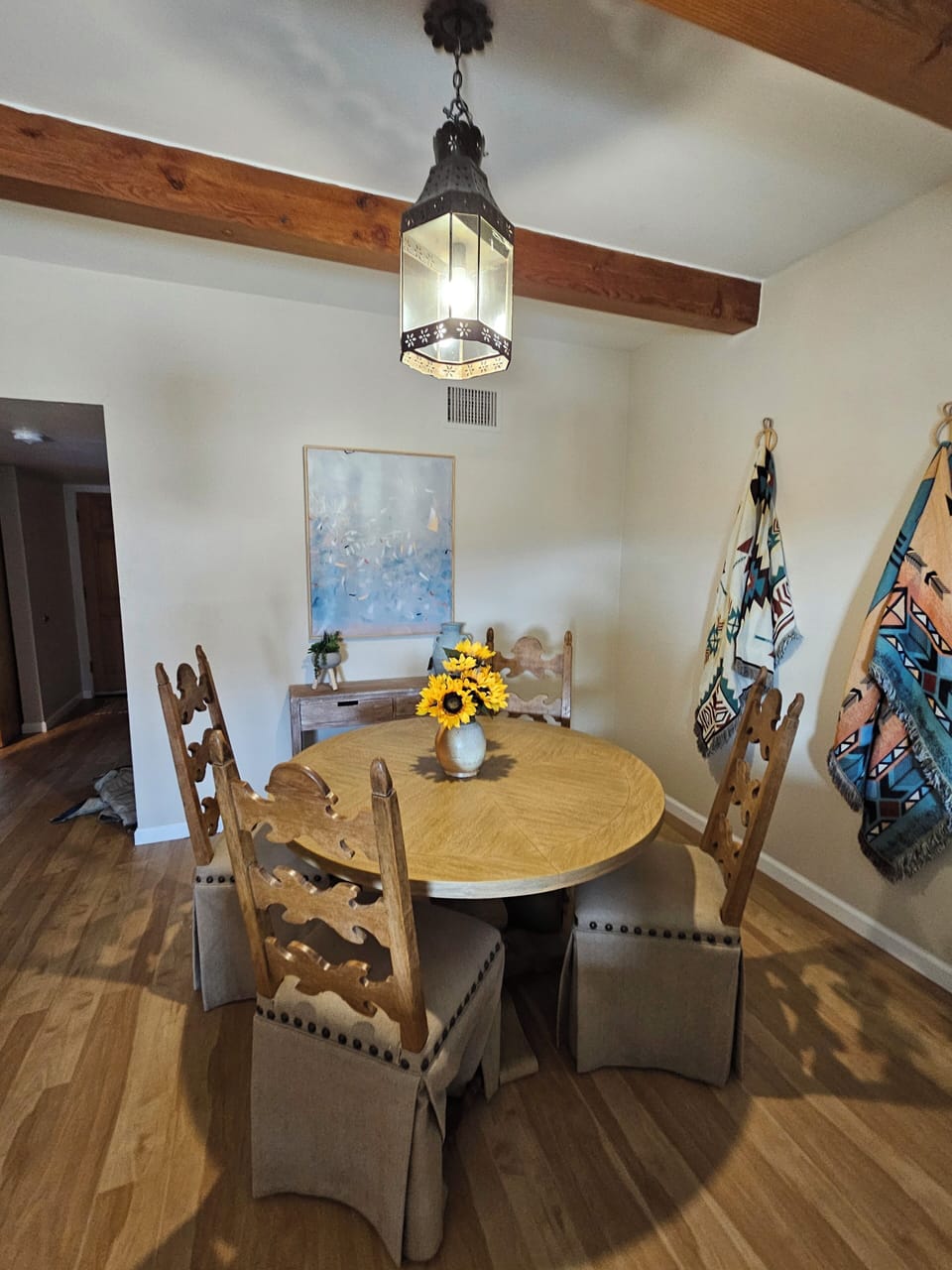 Formal dining table surrounded by beautiful high-end chairs in New Mexican style