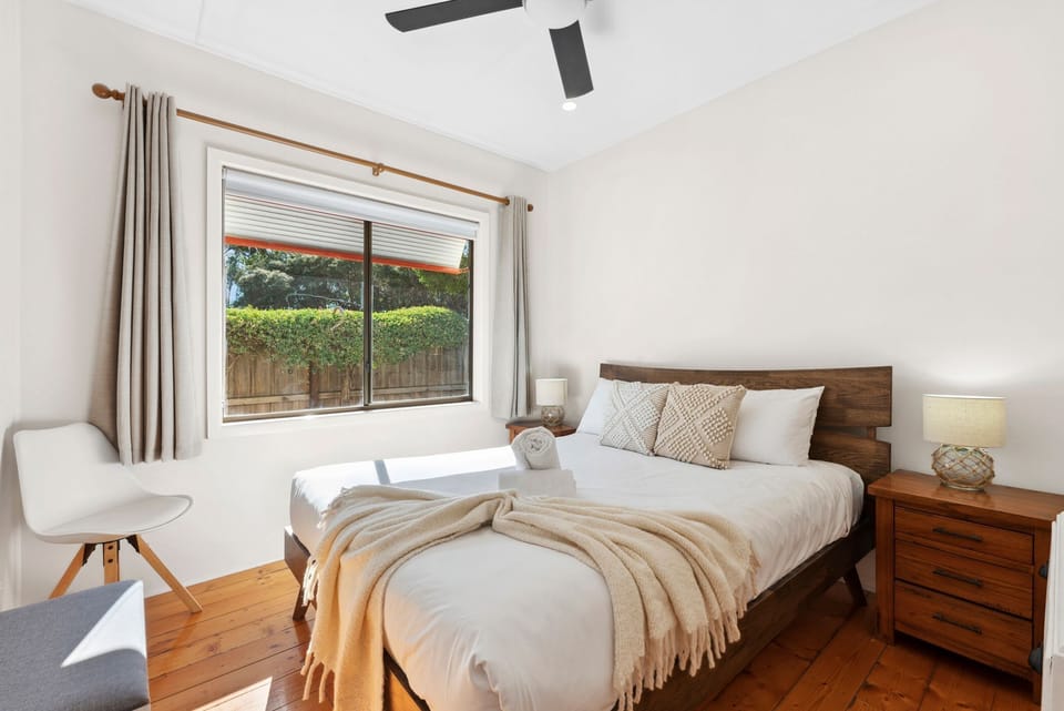 Four furnished bedrooms offer comfortable retreats