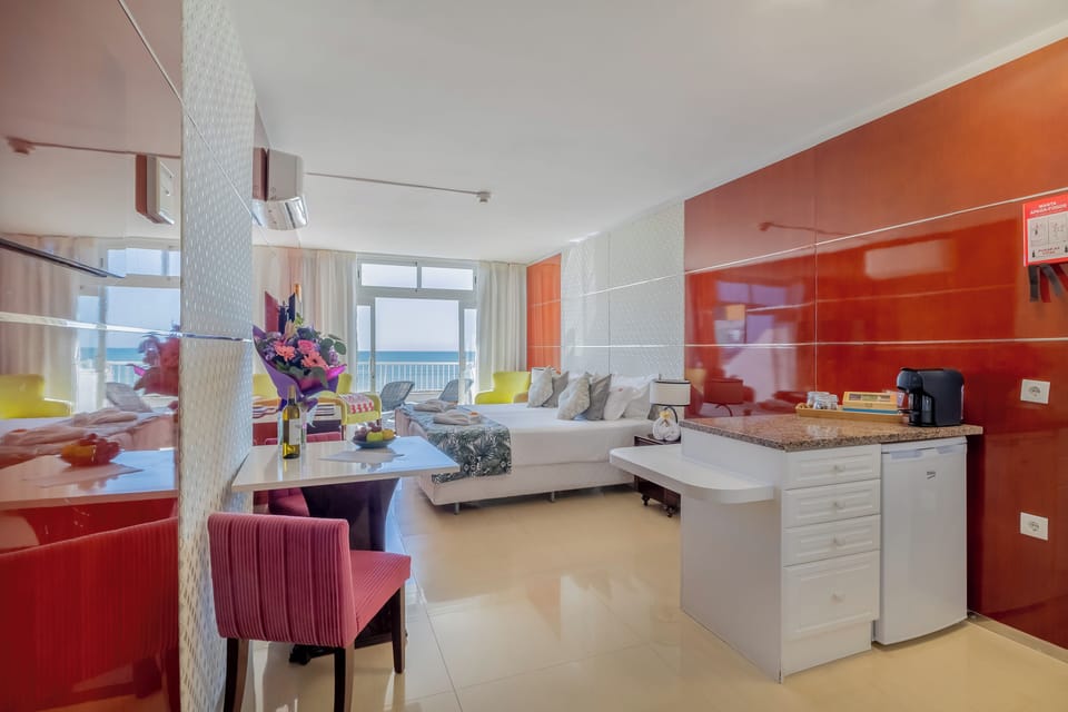 Spread out in the airy studio with kitchenette and seating.