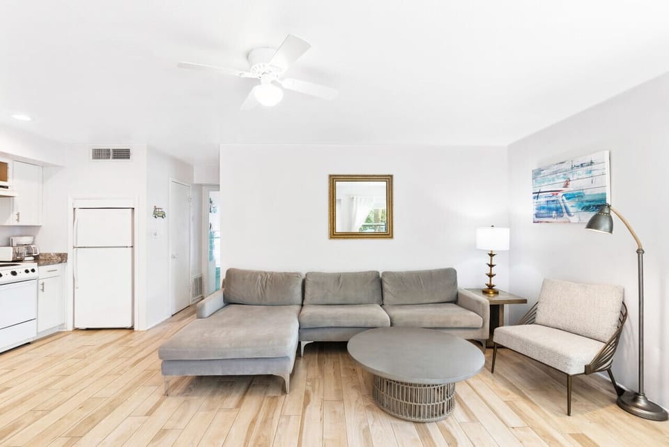 Living room has single roll-away bed