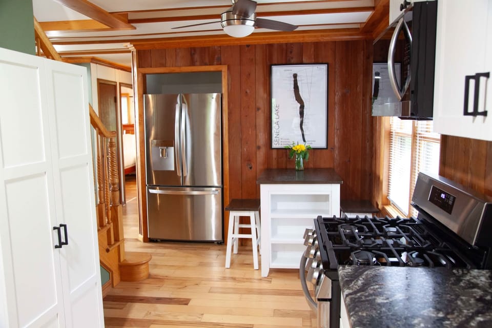 Eat-In Kitchen – Flexible seating with rustic warmth and practical flow.