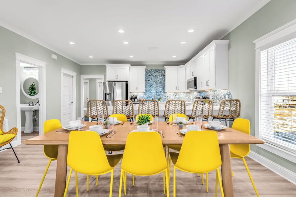 The open concept living area is optimal for entertaining, dining, and relaxing.