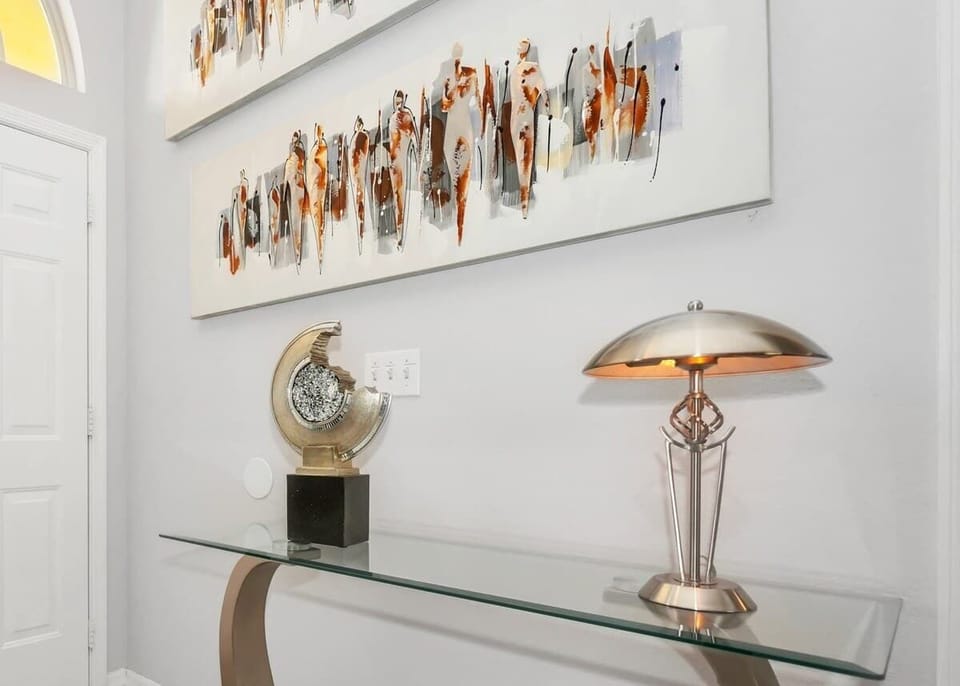 Chic Entry with Sleek Décor and Natural Light