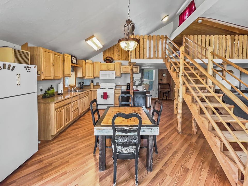 Kitchen and staircase to master bedroom loft 