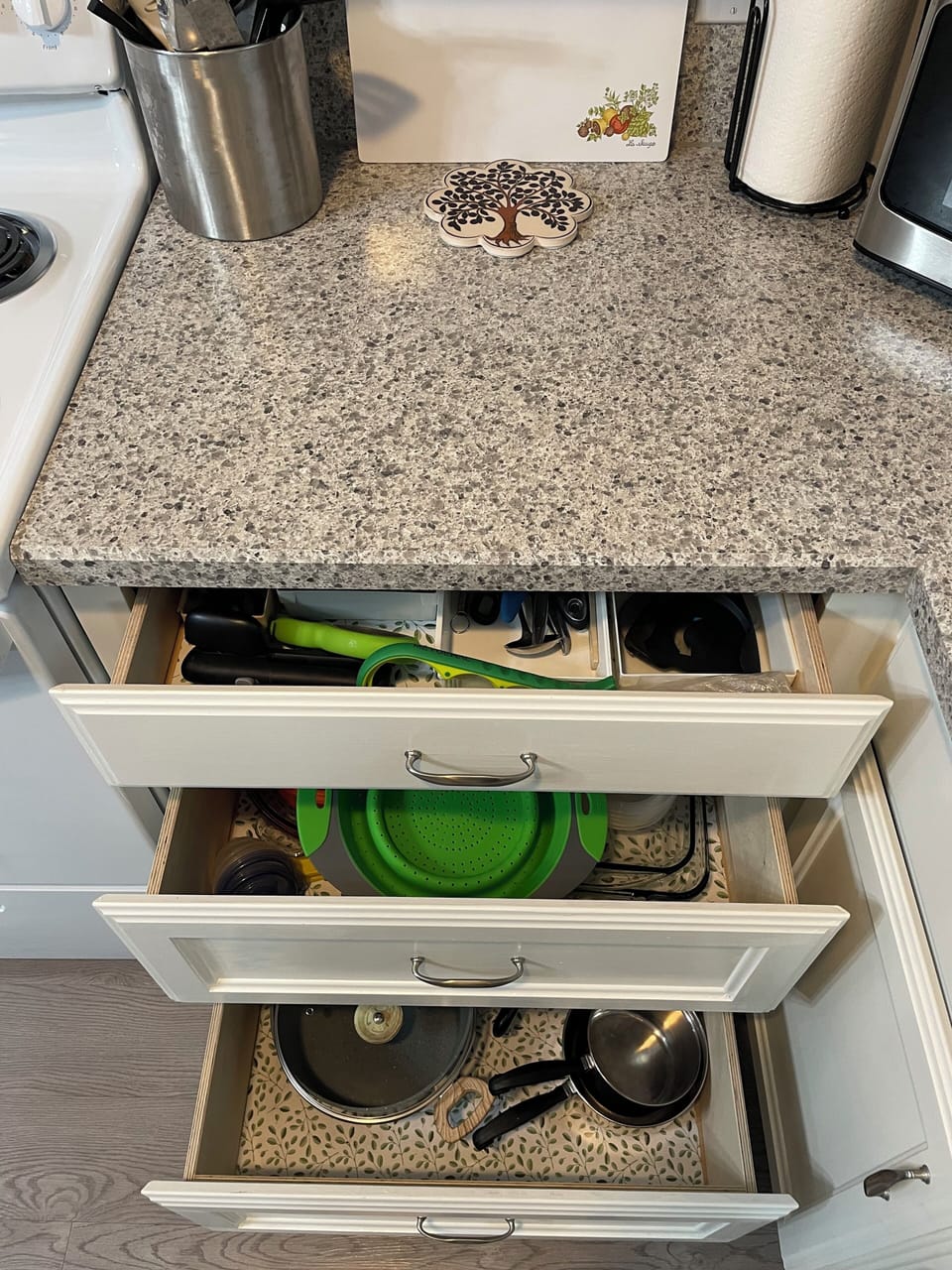 Lots of pots, pans, and other kitchen necessities. 