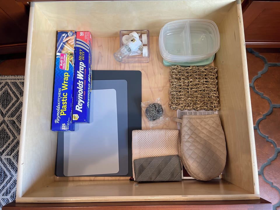 Incl. stovetop, fridge, freezer, microwave, pots, pans, utensils, keurig, etc