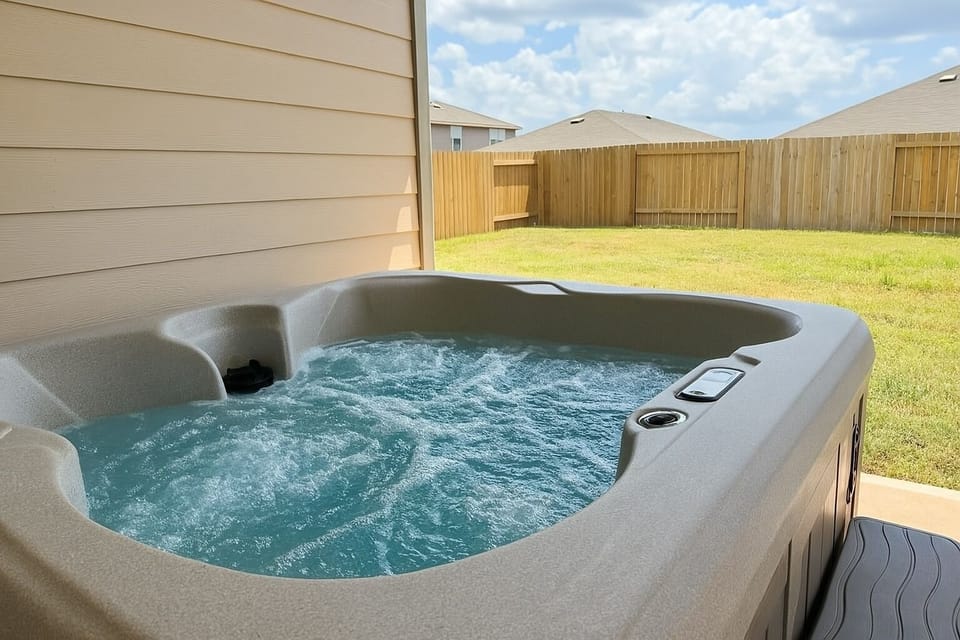 4 person hot-tub in the covered area