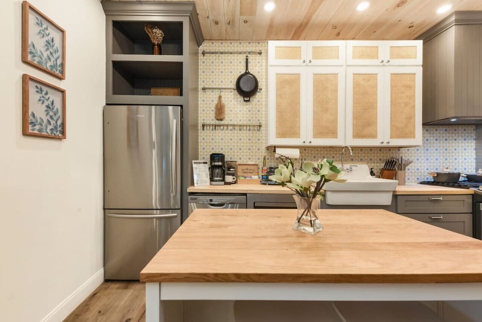 Fully stocked kitchen with island—perfect for cooking in or hosting