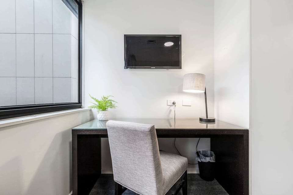 MASTER BEDROOM: Featuring a dedicated desk ideal for work, study, or staying organized during your stay.