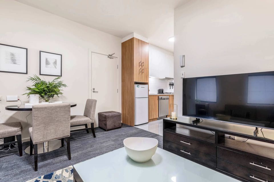 LIVING & DINING: Bright, open layout connecting the living and dining areas for a warm and welcoming atmosphere