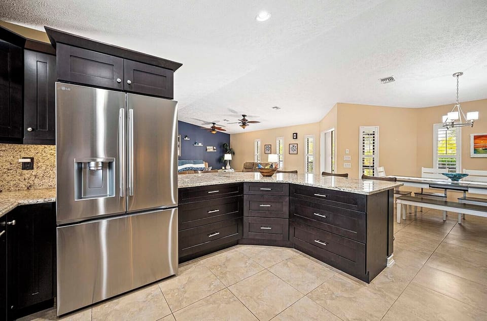 Wrap Around Bar with View of the Living Room