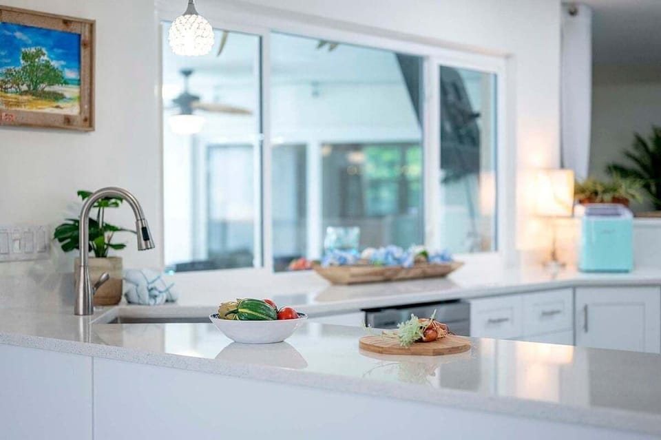 Cocoa Cabana has Great Views of the Pool/Patio from the Kitchen