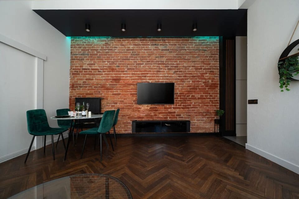 Comfortable Living Room with Sofa Bed and Smart TV | Book Now with RENTUJEMY