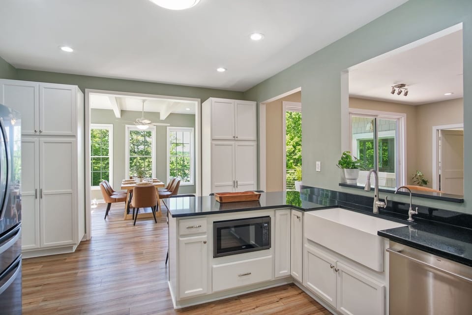 Modern kitchen with gas burners, farmhouse sink, and plenty of storage