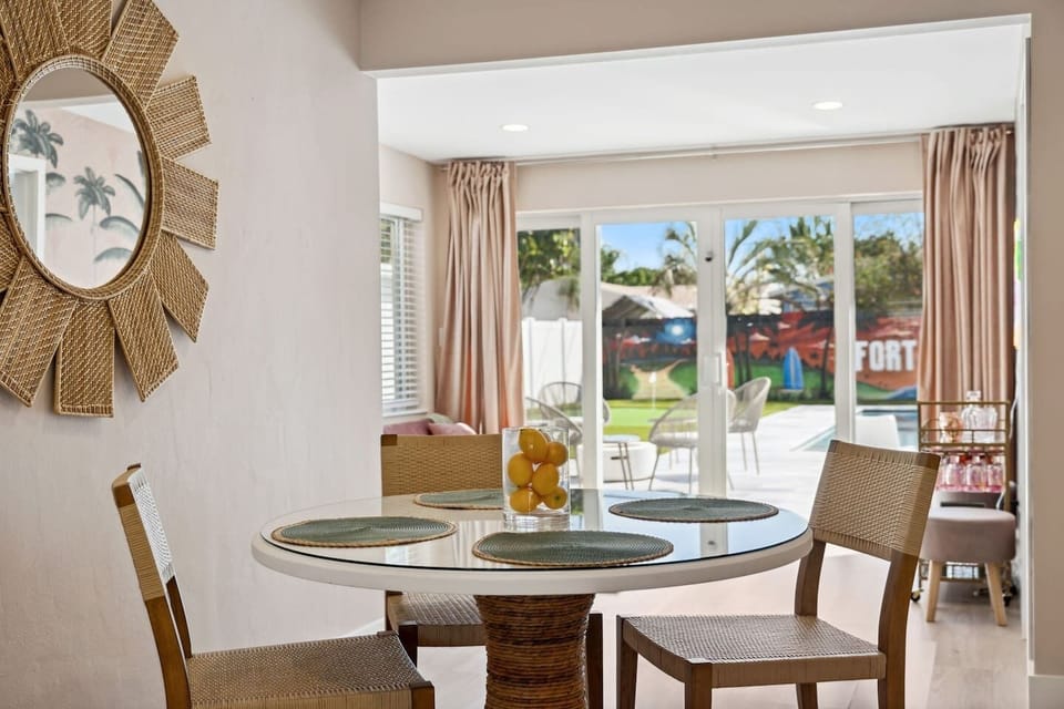 Dine with a view of our beautiful backyard oasis and pool area!