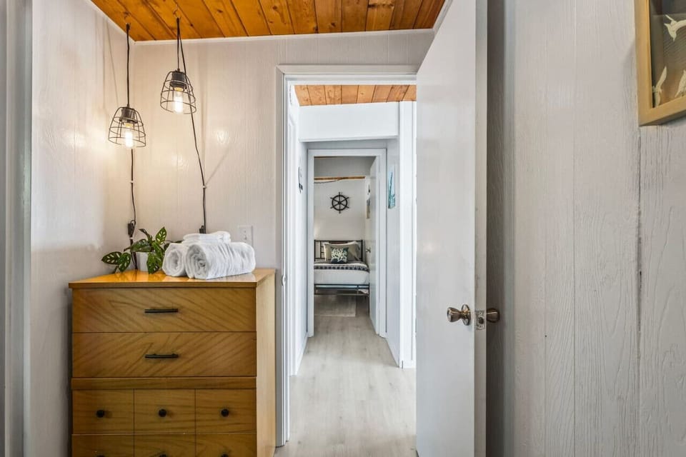 Primary bedroom looking into hallway.