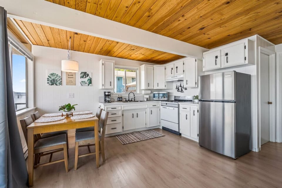 Kitchen is stocked with bakeware and appliances!