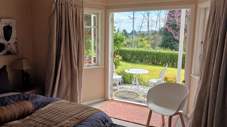 French windows opening onto deck in bedroom 2