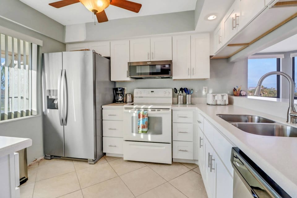 The kitchen has abundant cabinets, full-size appliances and is well stocked with cookware, dinnerware and many kitchen tools and gadgets.