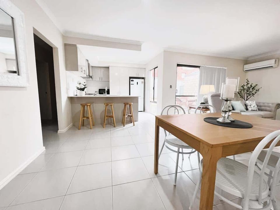 Experience spacious open-plan living! Our combined kitchen, dining, and living area is perfect for gathering, relaxing, and making memories.