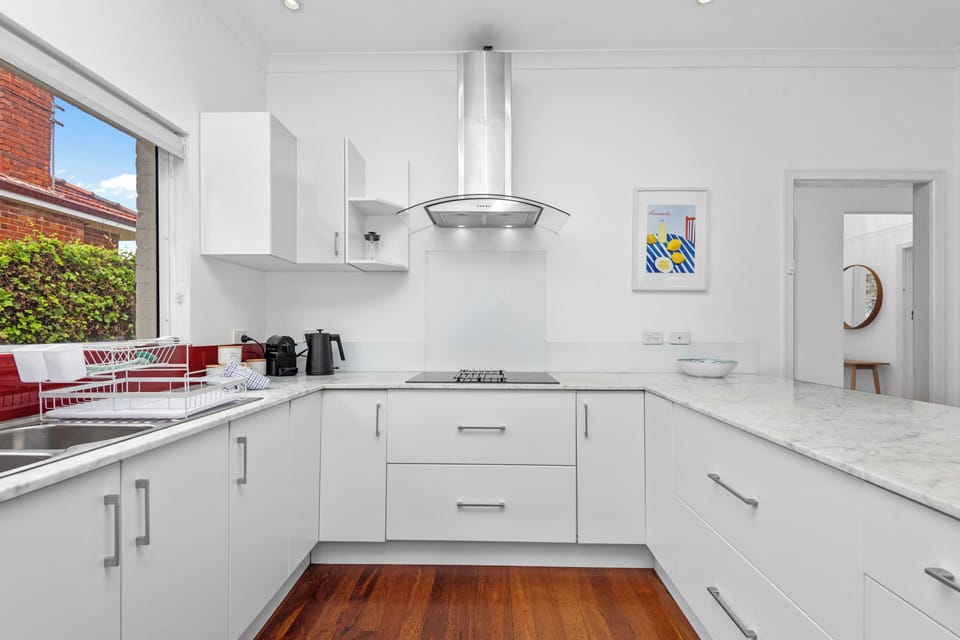 Bright and ready for your culinary creations! Our well-equipped kitchen offers everything you need to feel at home.