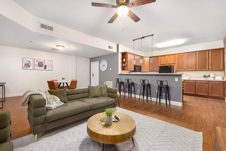 The open concept design creates a seamless flow between living, dining, and kitchen areas, perfect for entertaining and relaxation.