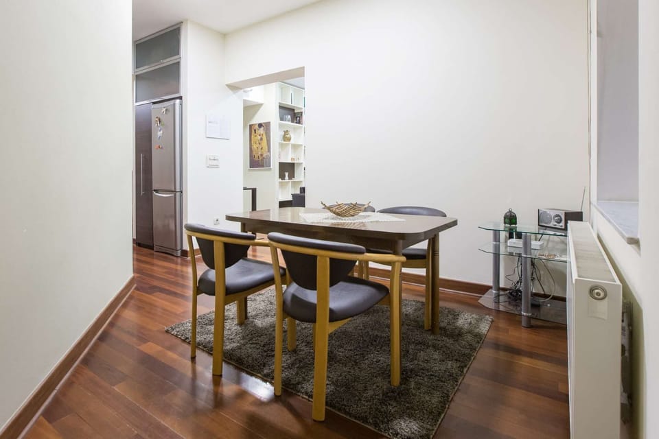 Dining area for 4-5 persons and the living room and the kitchen in the back