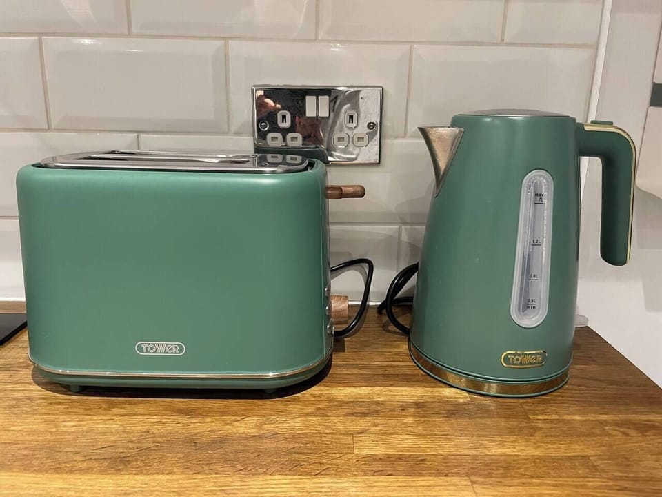 Ready for breakfast with our toaster, kettle, microwave and oven.