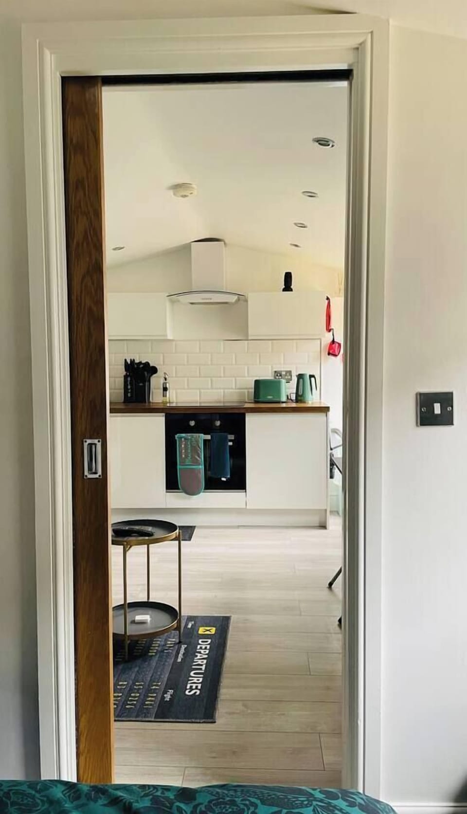 Useful kitchen with washing machine.