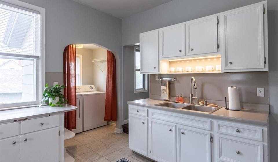 The laundry area is steps away from the kitchen