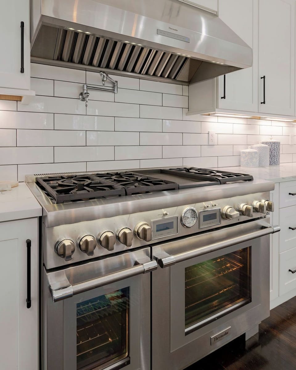 High end Thermador stainless steel stove w/double oven, 6 burners, & griddle. 