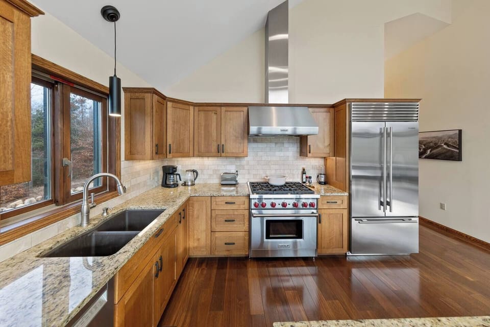 Zoom-in view of the chef`s Kitchen (Wolf Gourmet oven and range)