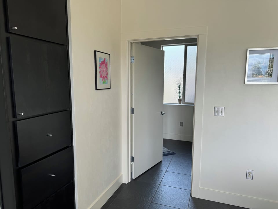 The master bathroom is attached to the bedroom