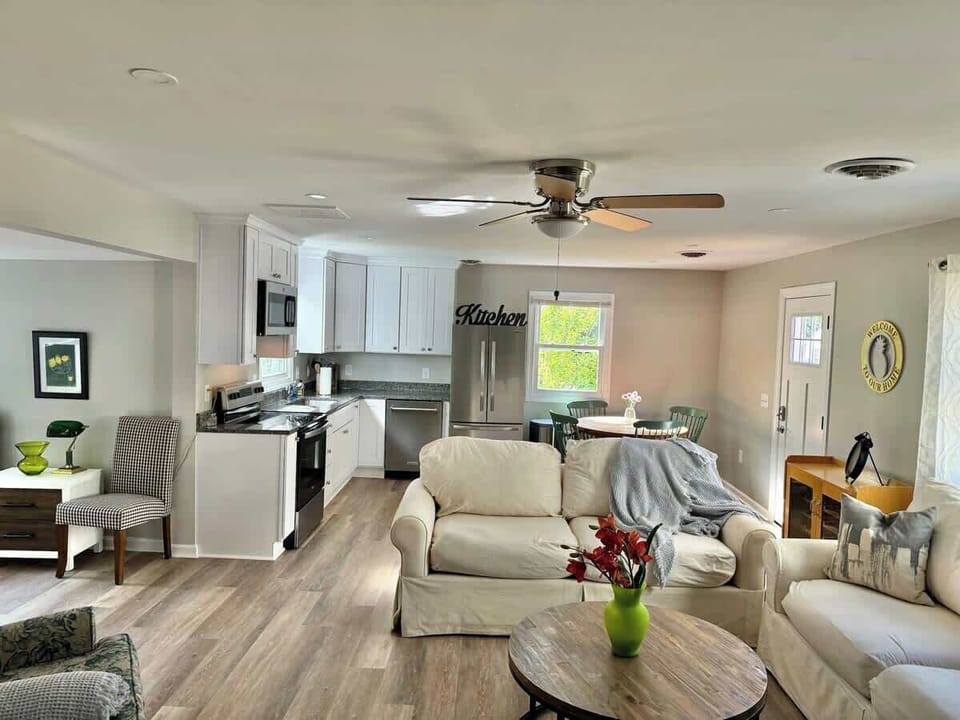 Bright and cozy open-concept living space perfect for gathering